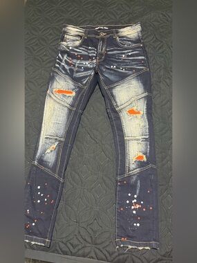 Arket Men's Skinny Jeans in Dark Blue with Orange Patch and Paint Splatter